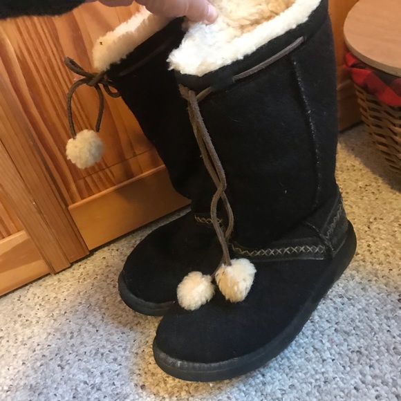 Ugg Shoes Black Wool Ugg Boots With Pom Pom Ties Poshmark Ugg Shoes Black Wool Ugg Boots With Pom Pom Ties Poshmark